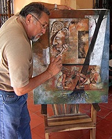 Artist Francisco Hoil with his art